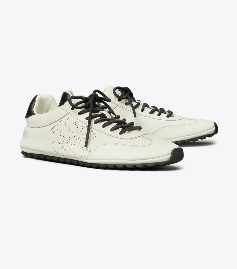 Tory Burch designer sneakers Field Sneaker in BLANC / PERFECT BLACK angle