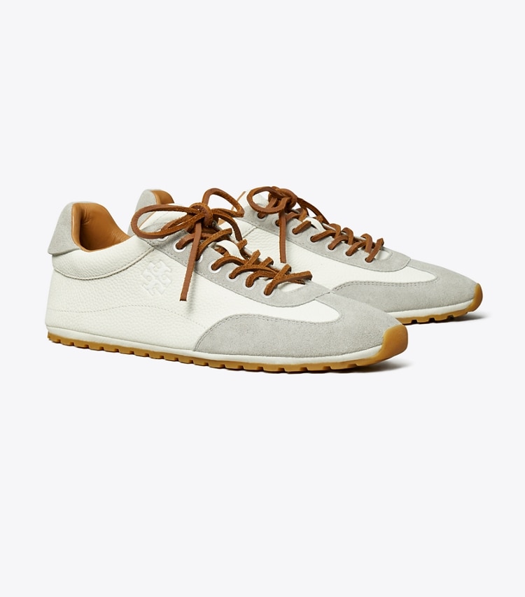 Tory Burch designer sneakers Field Sneaker in BLANC / LOUTRE GRAY angle