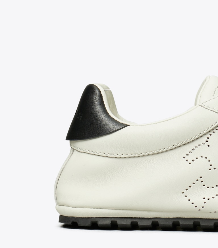 Tory Burch designer sneakers Field Sneaker in BLANC / PERFECT BLACK angle