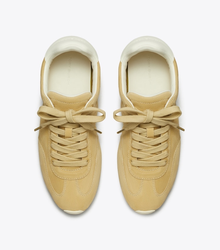 Tory Burch designer sneakers Field Sneaker in PRALINE / BLANC overhead