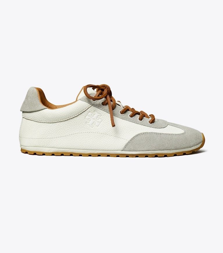 Tory Burch designer sneakers Field Sneaker in BLANC / LOUTRE GRAY angle