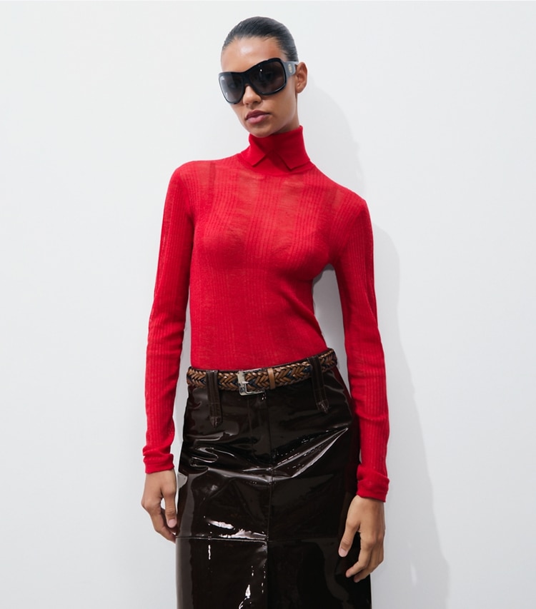 Tory Burch designer sweaters Fine Rib Turtleneck in Strawberry on model detail