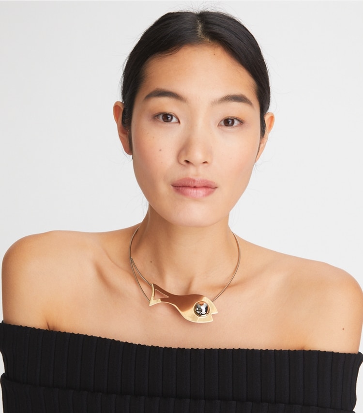 Tory Burch designer necklaces Fish Collar Necklace in Brass / Silver accessory on model