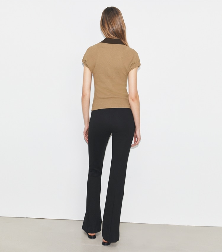Tory Burch designer bottoms Flared Compression Pant in Black on model back