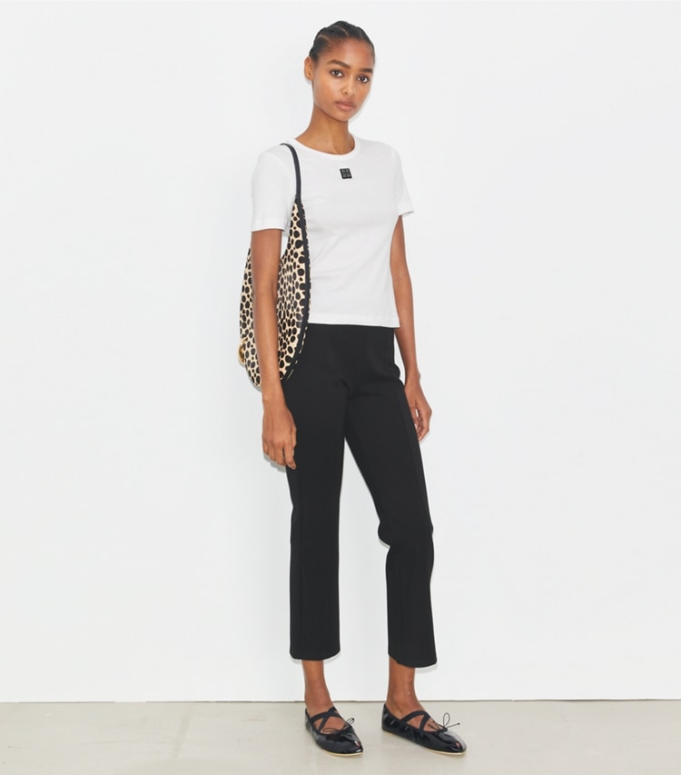 Tory Burch designer bottoms Flared Cropped Compression Pant in Black on model front