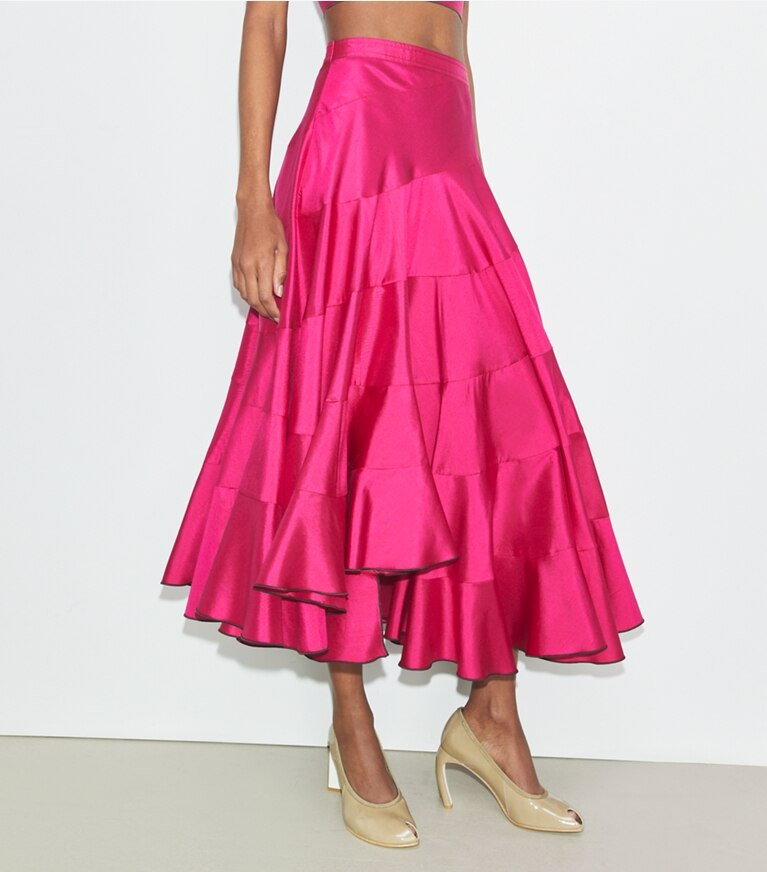 Tory Burch designer bottoms Flared Silk Skirt in Bold Pink on model detail