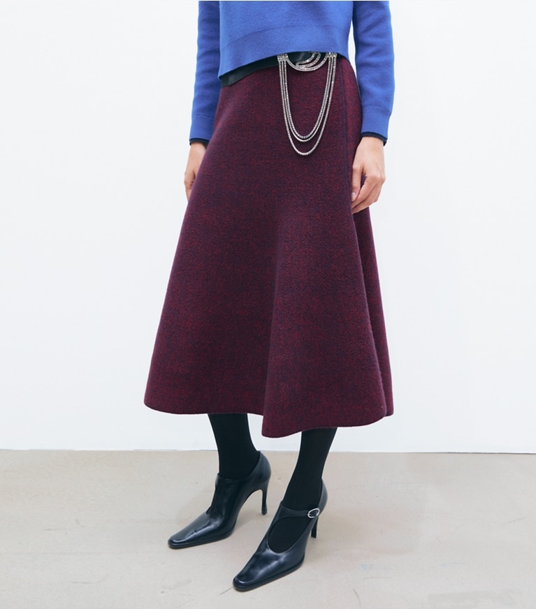 Tory Burch designer bottoms Flared Wool Skirt in Red Begonia / Evening Blue on model detail