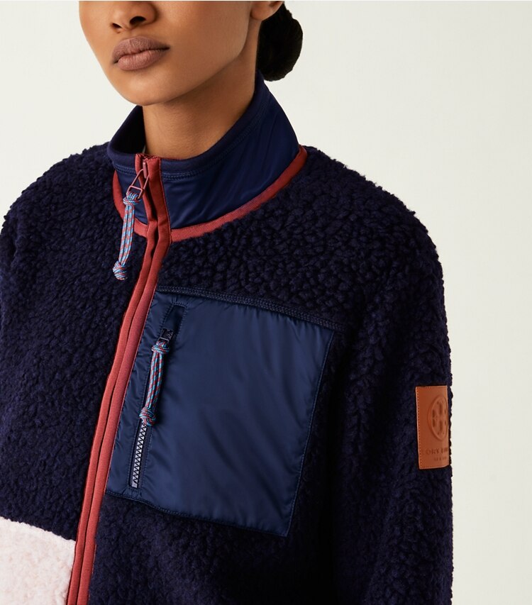 Tory Sport designer coats Fleece Colorblock Jacket in Tory Navy on model detail