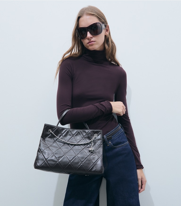 Tory Burch designer satchels Fleming Carryall in Cocoa additional on model