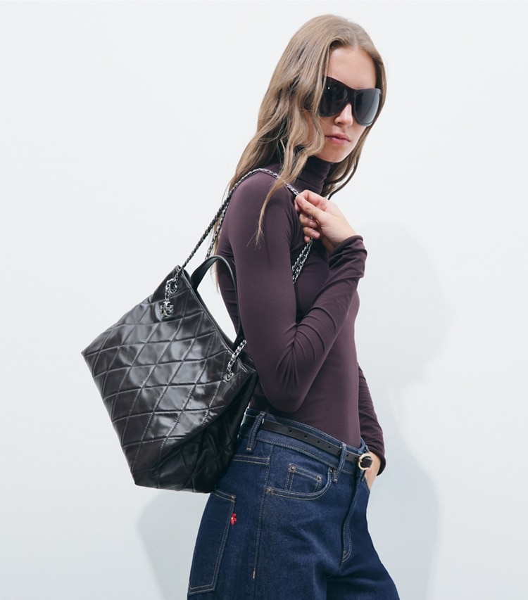 Tory Burch designer satchels Fleming Carryall in Cocoa additional on model