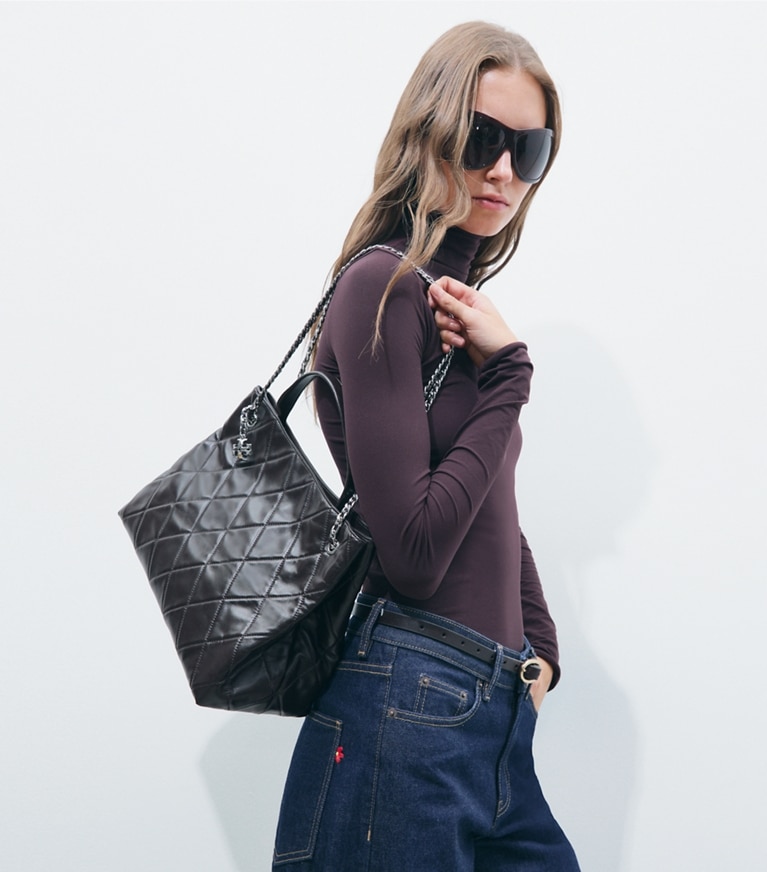 Tory Burch designer satchels Fleming Carryall in Cocoa additional on model