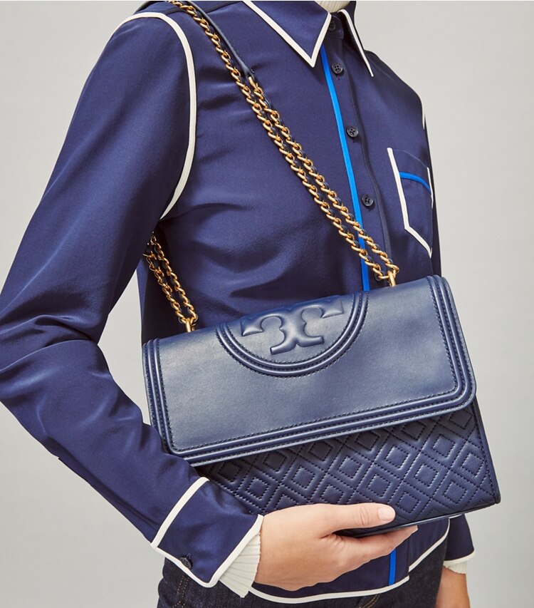 Tory Burch designer shoulder bags Fleming Convertible Shoulder Bag in Royal Navy accessory on model