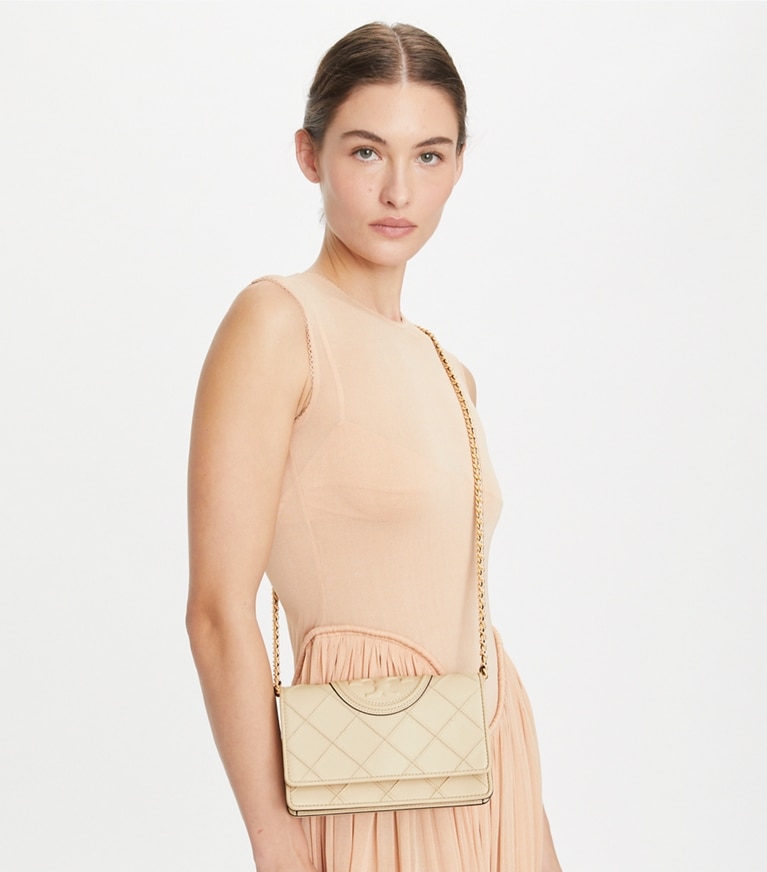 Tory Burch designer mini bags Fleming Crossbody in New Cream accessory on model