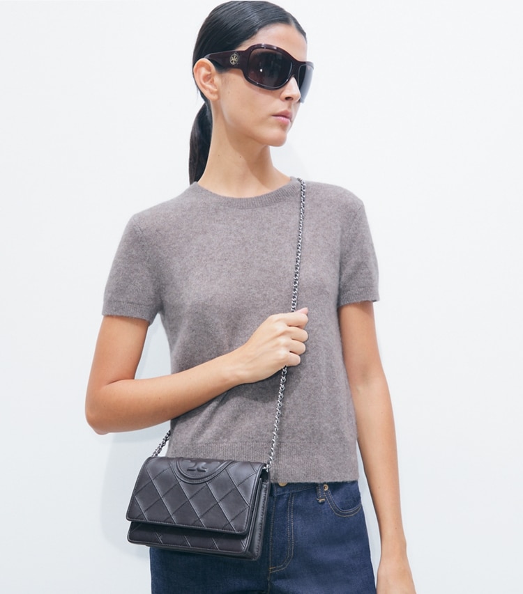 Tory Burch designer crossbody bags Fleming Crossbody in Cocoa accessory on model