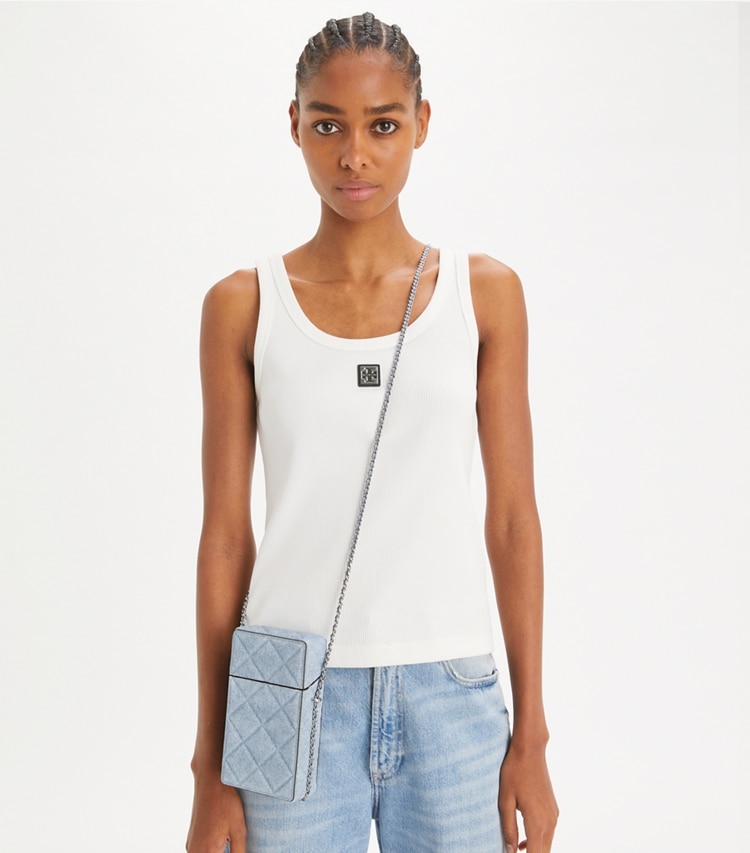 Tory Burch designer mini bags Fleming Denim-Print Suede Phone Crossbody in Denim accessory on model