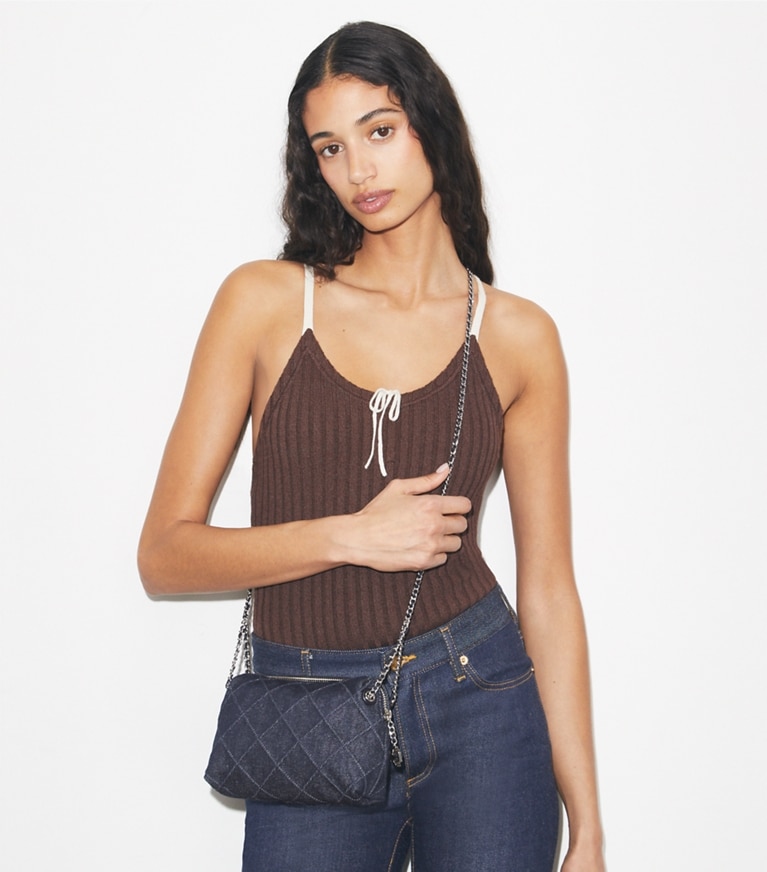 Tory Burch designer crossbody bags Fleming Denim Soft Crossbody Bag in Blue accessory on model