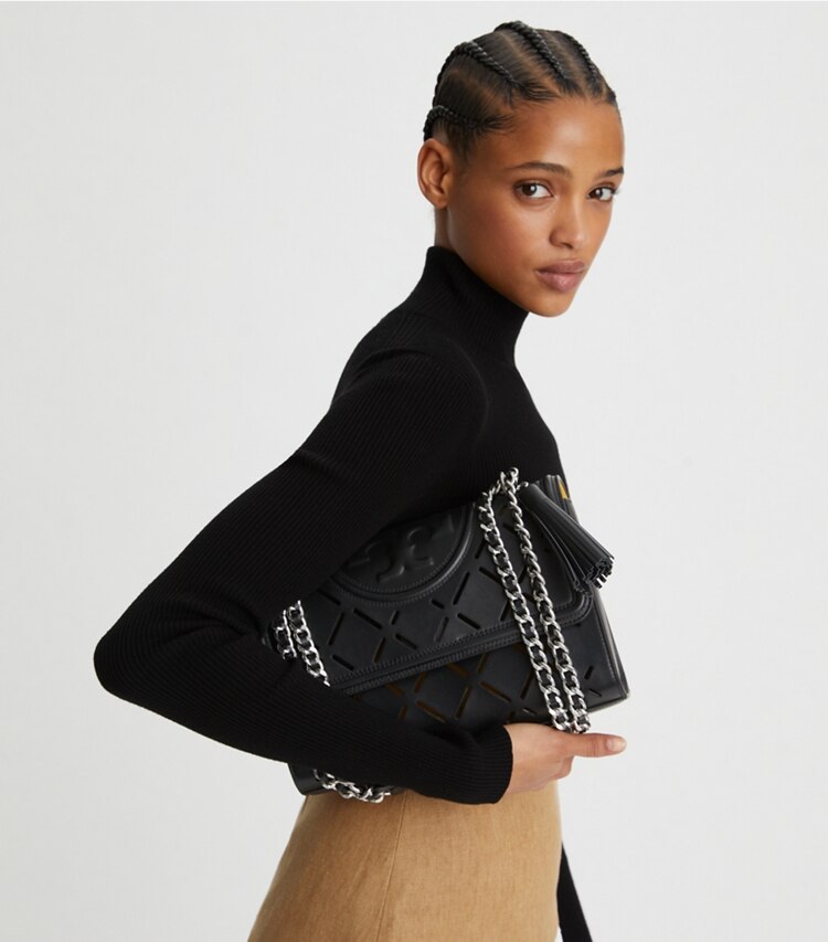 Tory Burch designer shoulder bags Fleming Diamond Perforated Convertible Shoulder Bag in Black additional on model