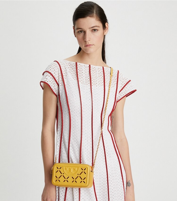Tory Burch designer crossbody bags Fleming Diamond Perforated Double-Zip Mini Bag in Golden Sunset / Orange Citrine accessory on model