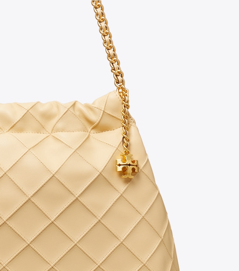 Tory Burch designer ホーボーバッグ フレミング ドローストリングバッグ in Vanilla Soft Serve angle