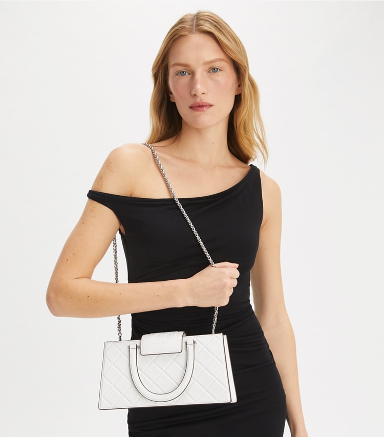 Tory Burch designer satchels Fleming East-West Tote in Blanc additional on model