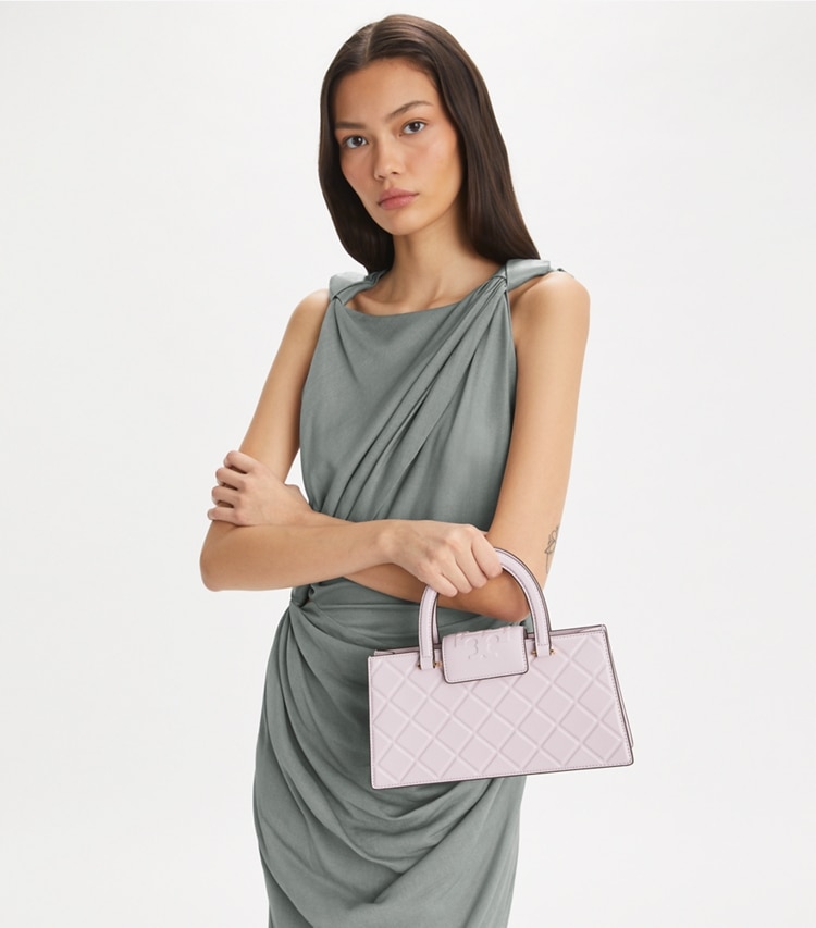 Tory Burch designer satchels Fleming East-West Tote in Pale Purple additional on model