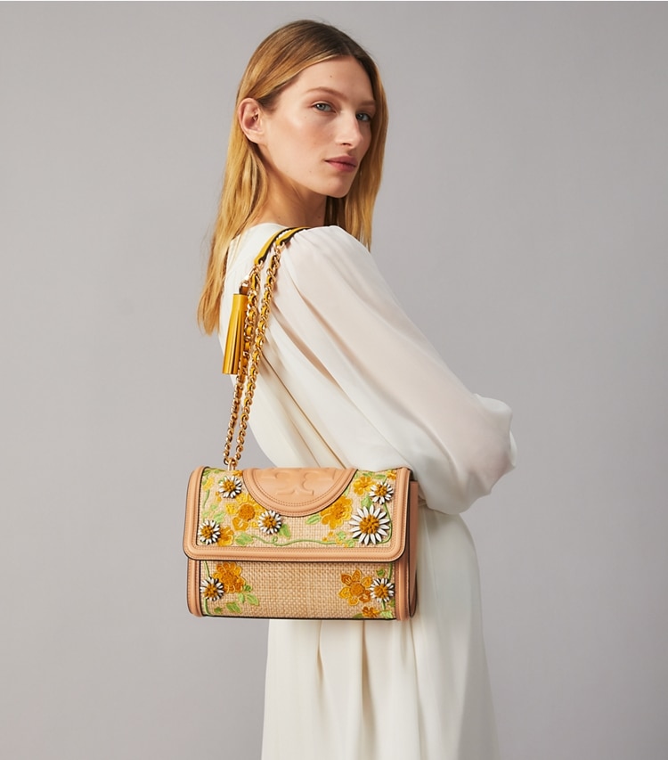 Tory Burch designer shoulder bags Fleming Embroidered Straw Convertible Shoulder Bag in Natural accessory on model