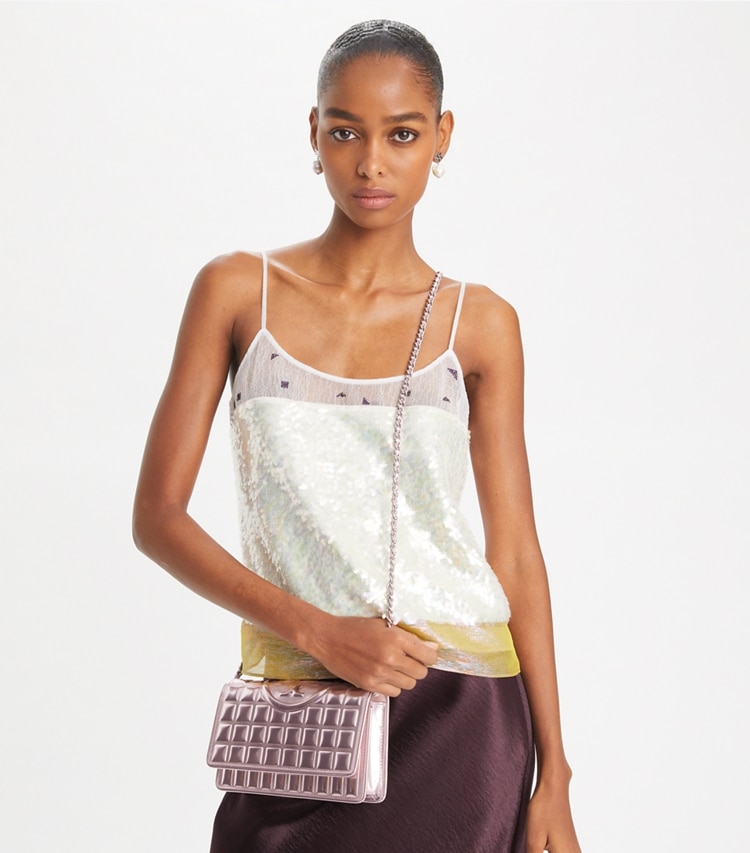 Tory Burch designer mini bags Fleming Metallic Quilt Crossbody in Sparkle Pink accessory on model