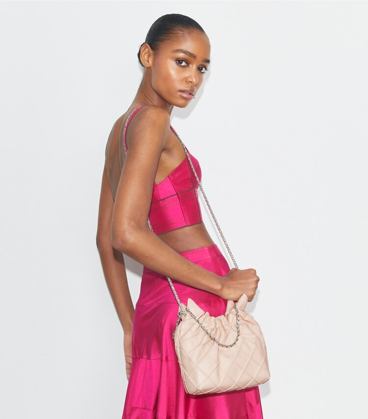 Tory Burch designer crossbody bags Fleming Mini Bag mit Tunnelzug in Soft Pink accessory on model