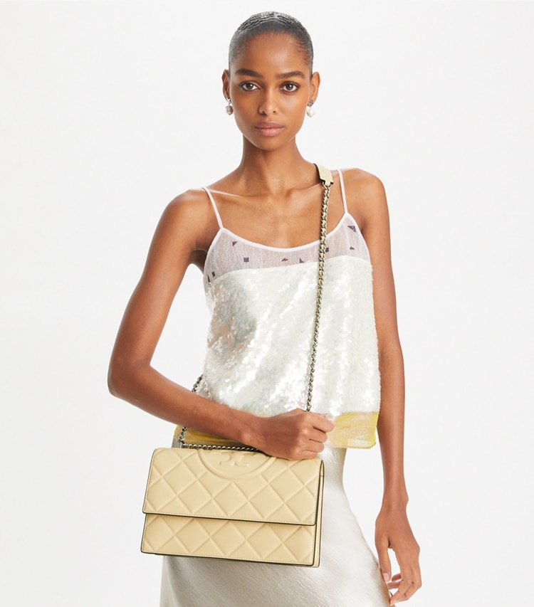 Tory Burch designer shoulder bags Fleming Shoulder Bag in Vanilla Soft Serve additional on model