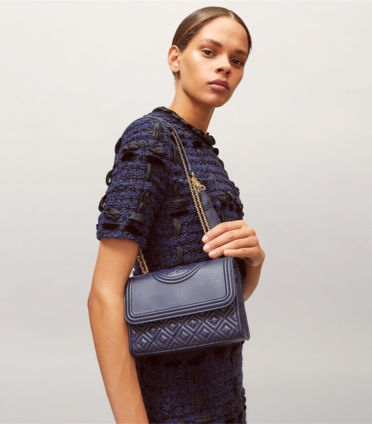 Tory Burch designer shoulder bags Fleming Small Convertible Shoulder Bag in Royal Navy accessory on model