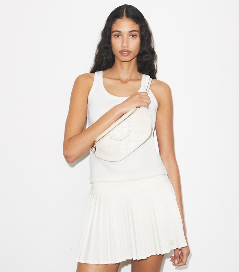 Tory Burch designer belt bags Fleming Soft Belt Bag in Light Cream accessory on model