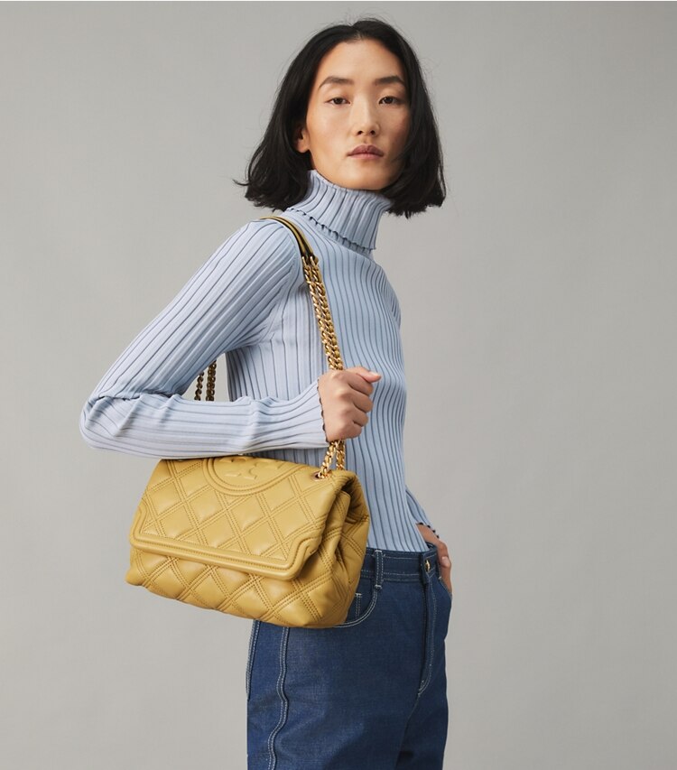 Tory Burch designer shoulder bags Fleming Soft Convertible Shoulder Bag in BEESWAX accessory on model