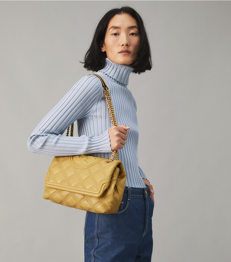 Tory Burch designer shoulder bags Fleming Soft Convertible Shoulder Bag in BEESWAX accessory on model