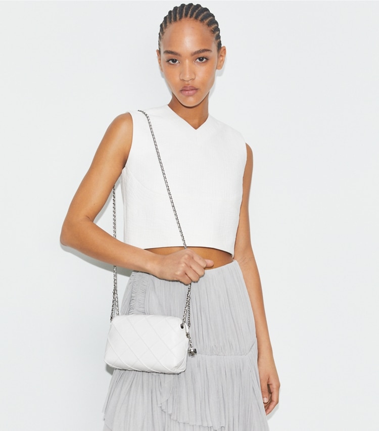 Tory Burch designer crossbody bags Fleming Soft Crossbody Bag in Blanc accessory on model