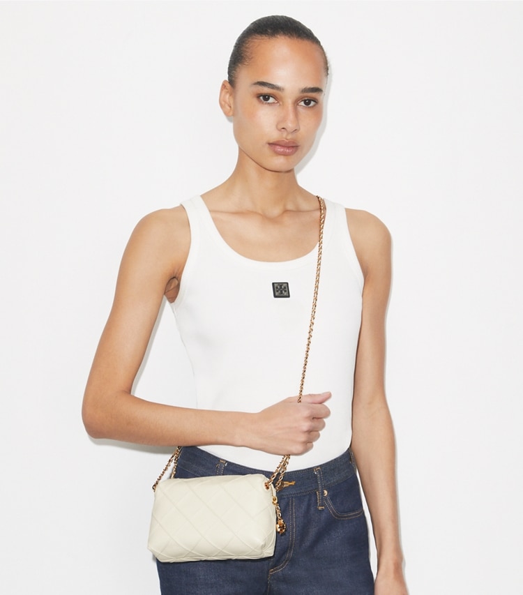 Tory Burch designer crossbody bags Fleming Soft Crossbody Bag in Light Cream accessory on model