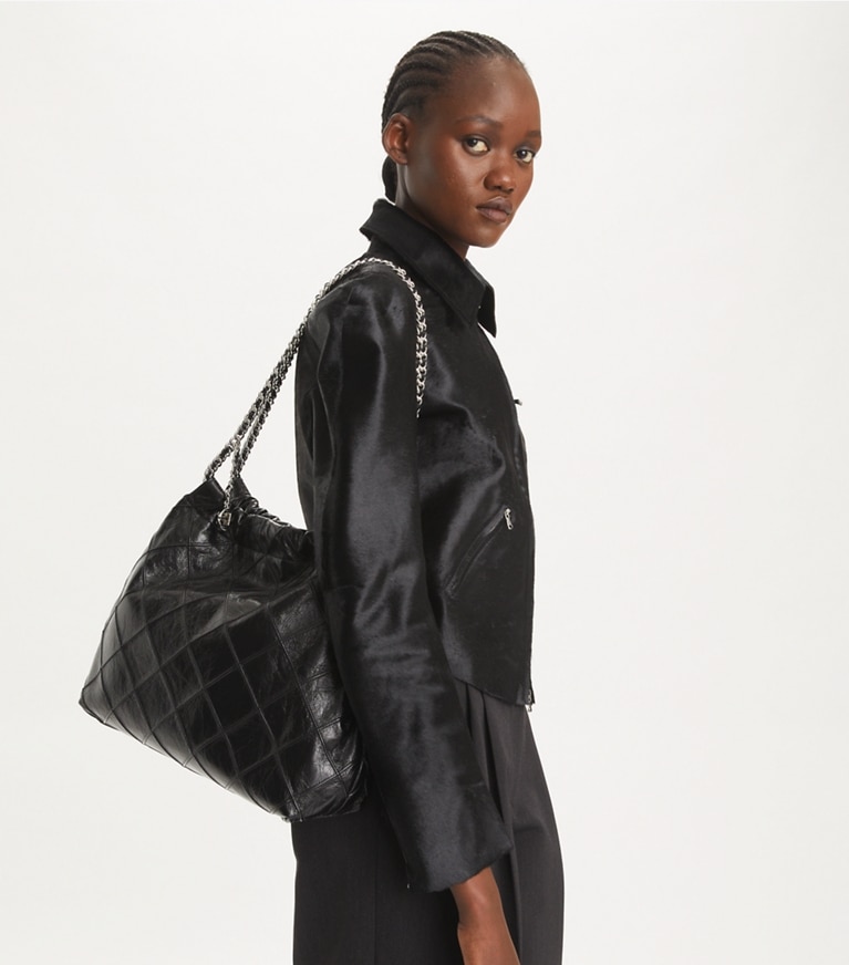 Tory Burch designer hobo bags Fleming Soft Distressed Hobo Bag in Black angle