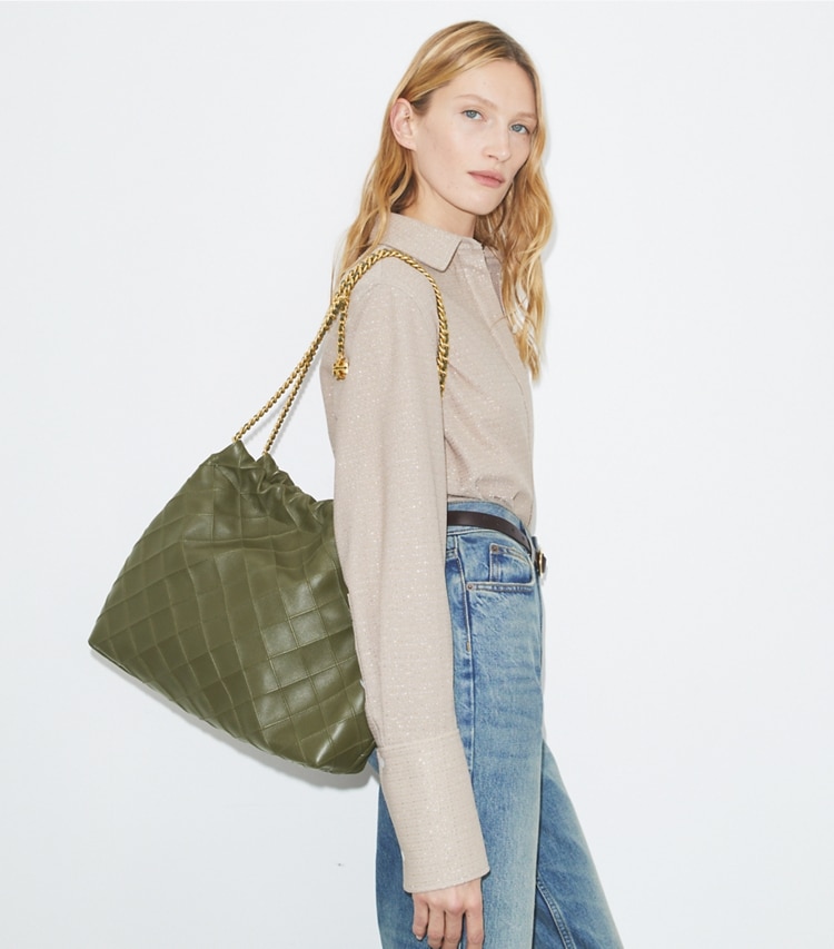 Tory Burch designer hobo bags Fleming Soft Hobo Bag in Dark Olive accessory on model