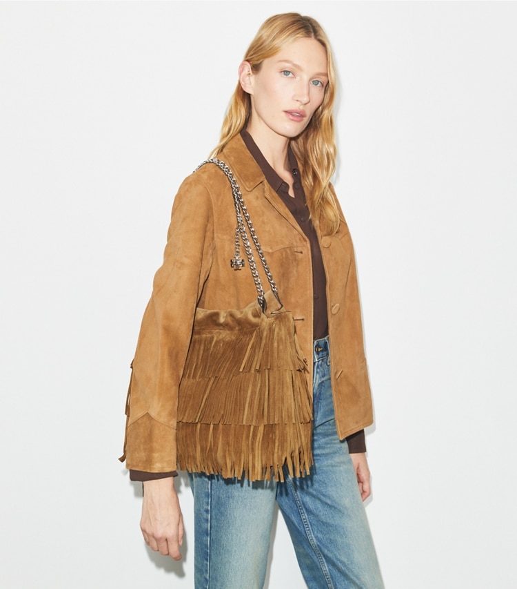 Tory Burch designer hobo bags Fleming Suede Fringe Hobo Bag in WILD TABACCO accessory on model