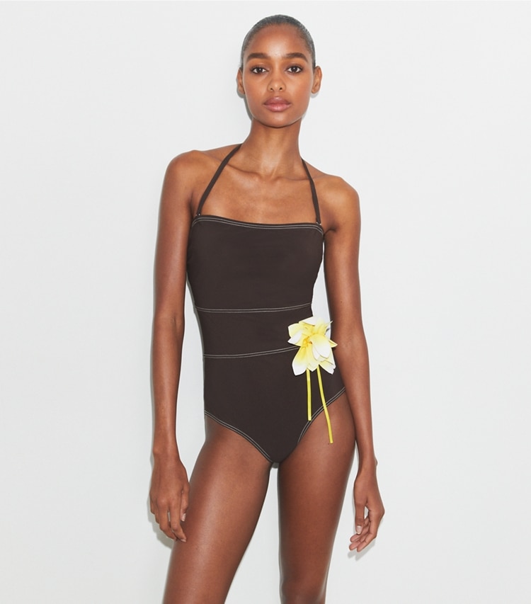 Tory Burch designer one pieces Flower Bandeau Swimsuit in Deep Chocolate on model detail