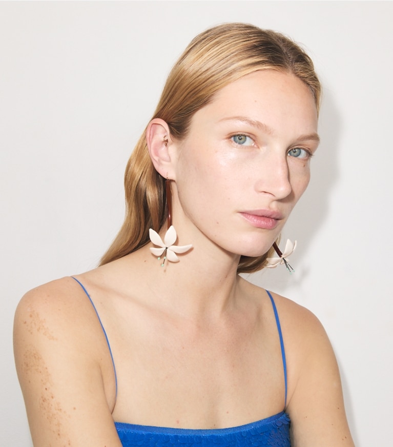 Tory Burch designer earrings Flower Earrings in Tortoise accessory on model