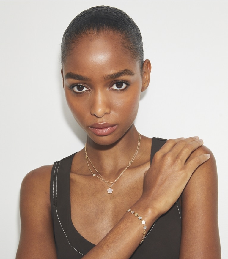 Tory Burch designer bracelets Forget Me Not Bracelet in Tory Gold / Mother of Pearl front