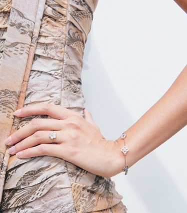 Tory Burch designer bracelets Forget Me Not Bracelet in Tory Gold / MOP Multi accessory on model
