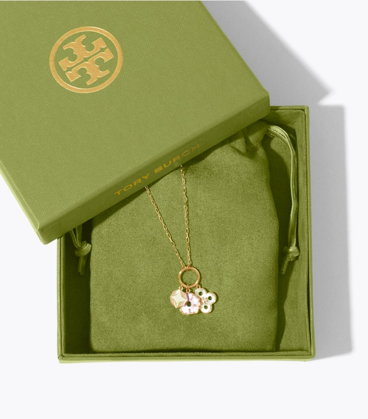 Tory Burch designer necklaces Forget Me Not Charm Pendant Necklace in Tory Gold / Mother of Pearl editorial
