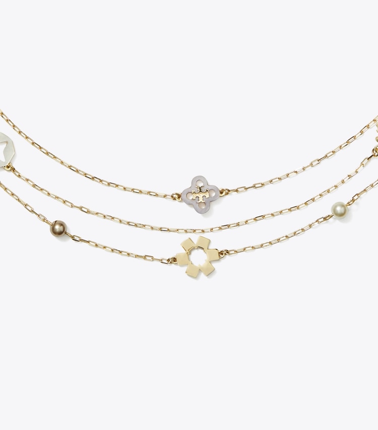 Tory Burch designer ネックレス キラ クローバー トリプルストランド ネックレス in Tory Gold / Pearl / Mother of Pearl ディテール