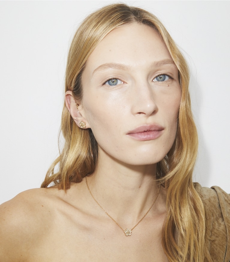 Tory Burch designer necklaces Forget Me Not Pavé Pendant Necklace in Tory Gold / Crystal front