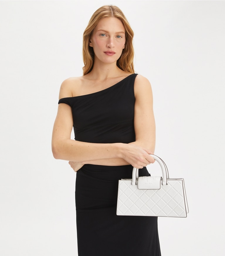 Tory Burch designer sac à main Fourre-tout East-West Fleming dans Blanc accessoire sur le modèle
