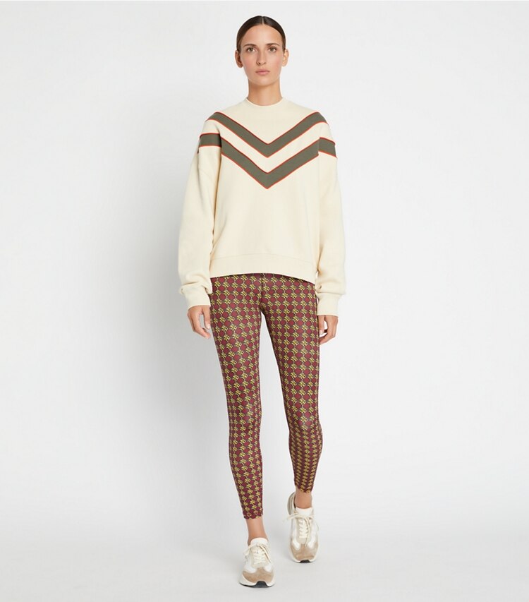 Tory Sport designer sweaters French Terry Chevron Crewneck in Sesame on model front