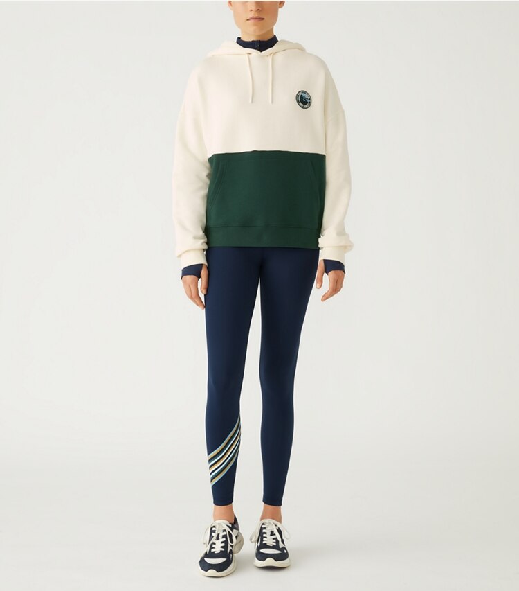 Tory Sport designer sweaters French Terry Color-Block Hike Hoodie in Conifer / Ivory Pearl on model front