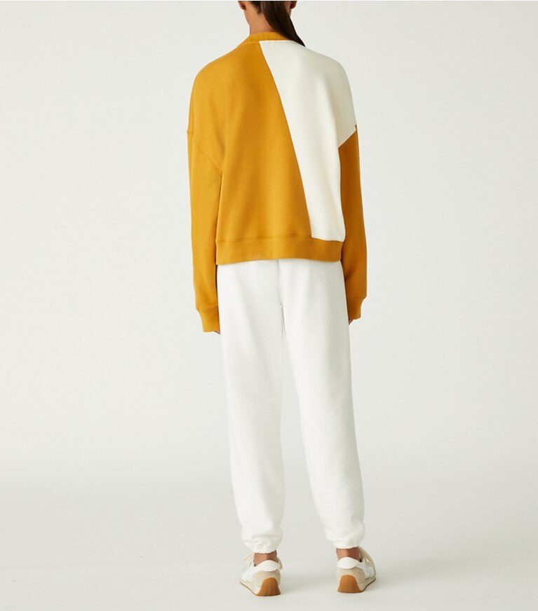 Tory Sport designer sweaters French Terry Diagonal Colorblock Crewneck in Spiced / Ivory Pearl front