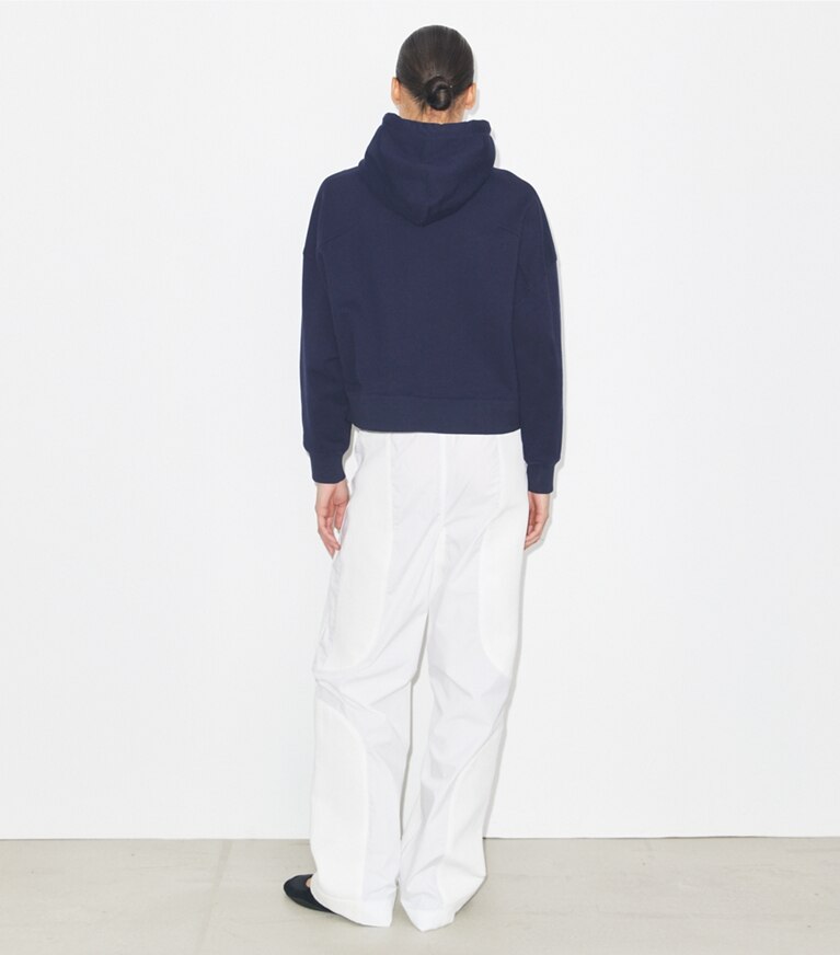 Tory Burch designer sweaters French Terry Hoodie in Medium Navy on model back